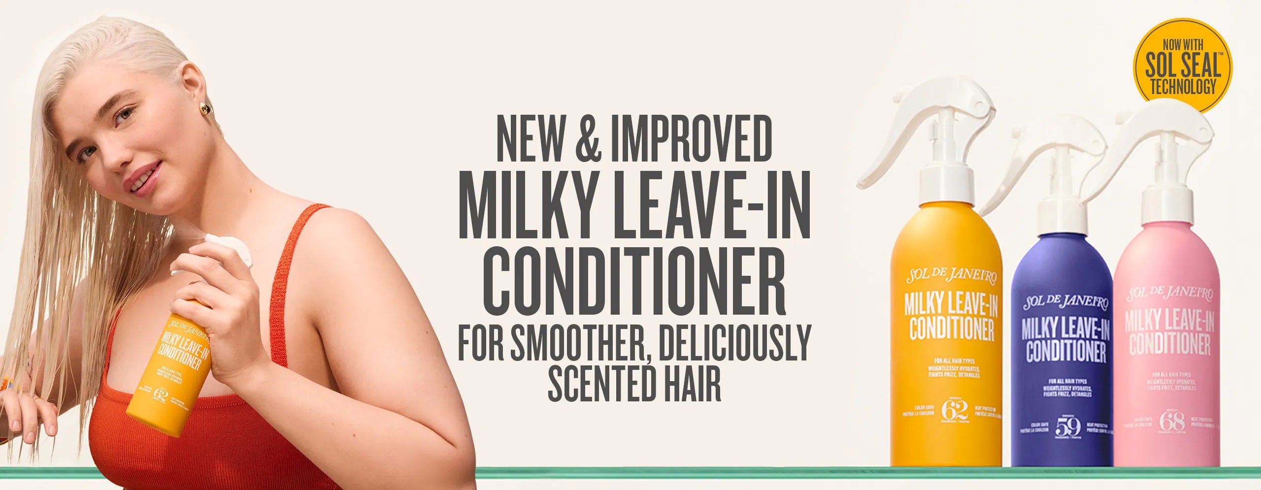 Woman holding a bottle of Milky Leave-In Conditioner with product bottles displayed on a white background. Woman holding a bottle of Milky Leave-In Conditioner with product bottles displayed on a white background.