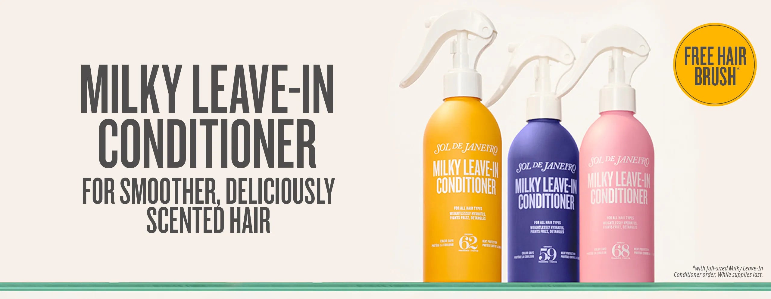 Three bottles of Milky Leave-In Conditioner with a free hair brush offer on a white background. Three bottles of Milky Leave-In Conditioner with a free hair brush offer on a white background.