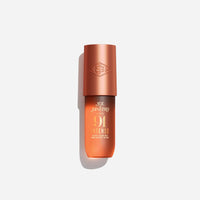 Sol Janeiro Cheirosa 91 intense perfume mist render image. A sleek metallic copper cap and a dark amber-orange body, set against a clean light gray background.