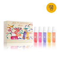 A boxed fragrance gift set labeled 'SOL DE JANEIRO SPATZ & SOIL' with five small spray bottles in pink, magenta, purple, orange, and yellow displayed in front on a white background. A yellow '$50 Value' badge appears in the top right.