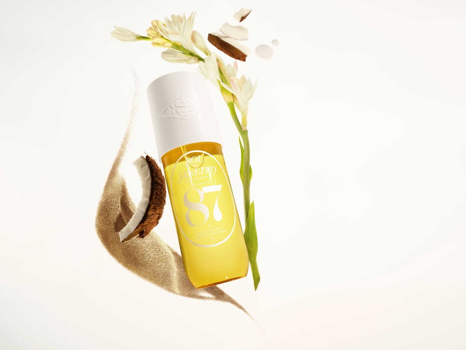 Sol de janeiro cheirosa 87 perfume mist yellow bottle with a white cap on a white background