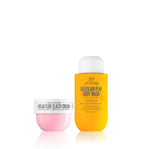 Two skincare products, a yellow bottle and a pink tube, on a white background.