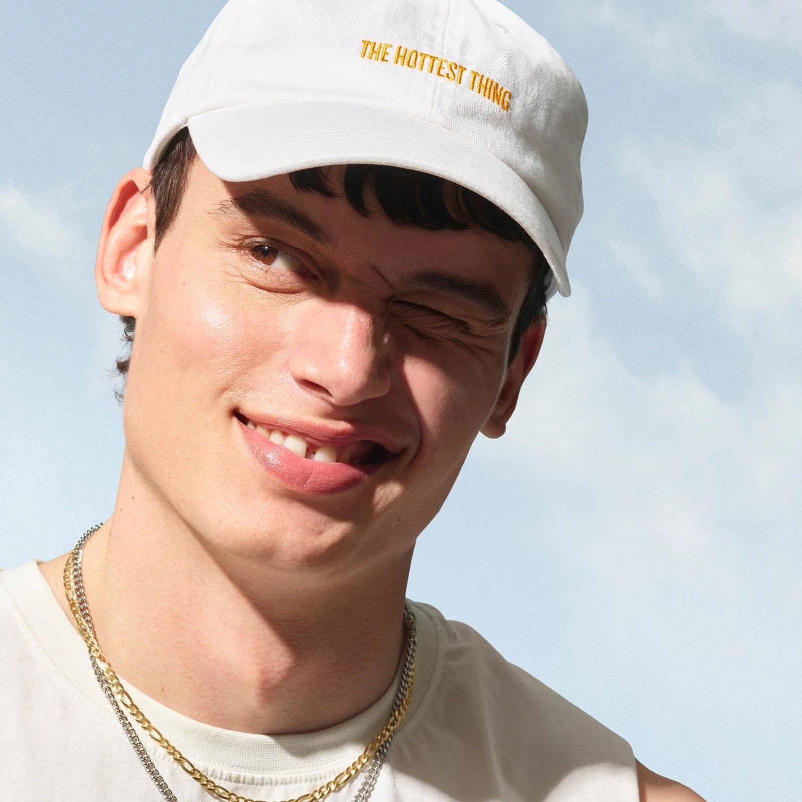 Model wearing the Sol de Janeiro badalada baseball hat