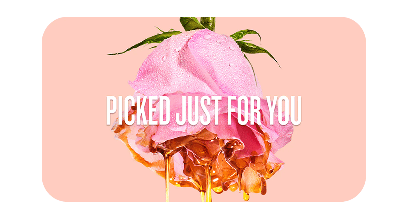 Pink flower with honey drizzle and 'Picked Just For You' text on a pink background