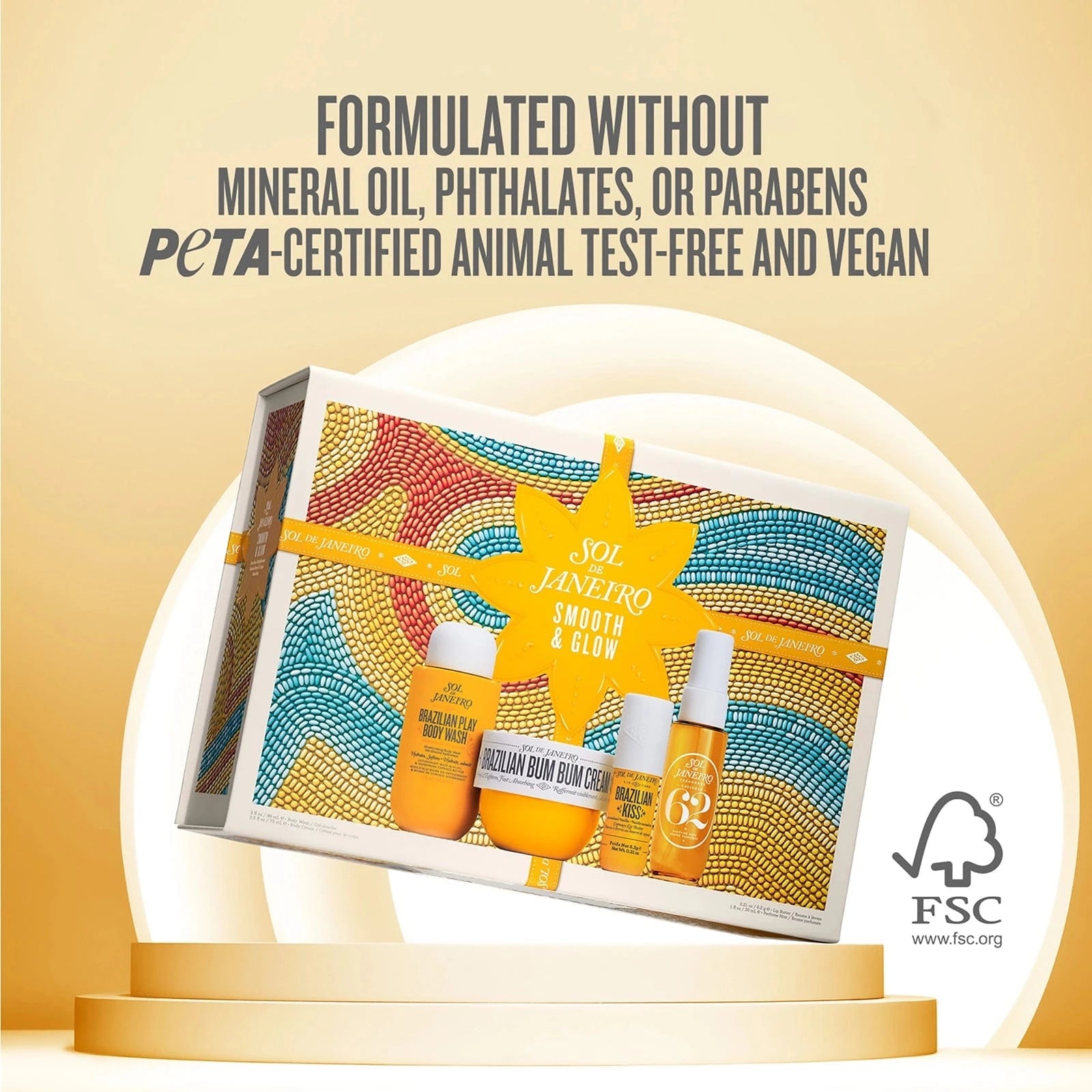 sol de janeiro smooth and glow bum bum body routine box routine set. text on image reads formulated without mineral oil, phthalates, or parabens peta-certified animal test-free and vegan