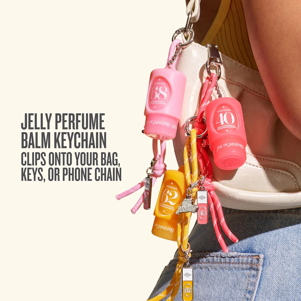 Pink and yellow personal care keychain set with SPF 38 and SPF 10 Balm units, clipped to a white shoulder bag with text on the left explaining its use.