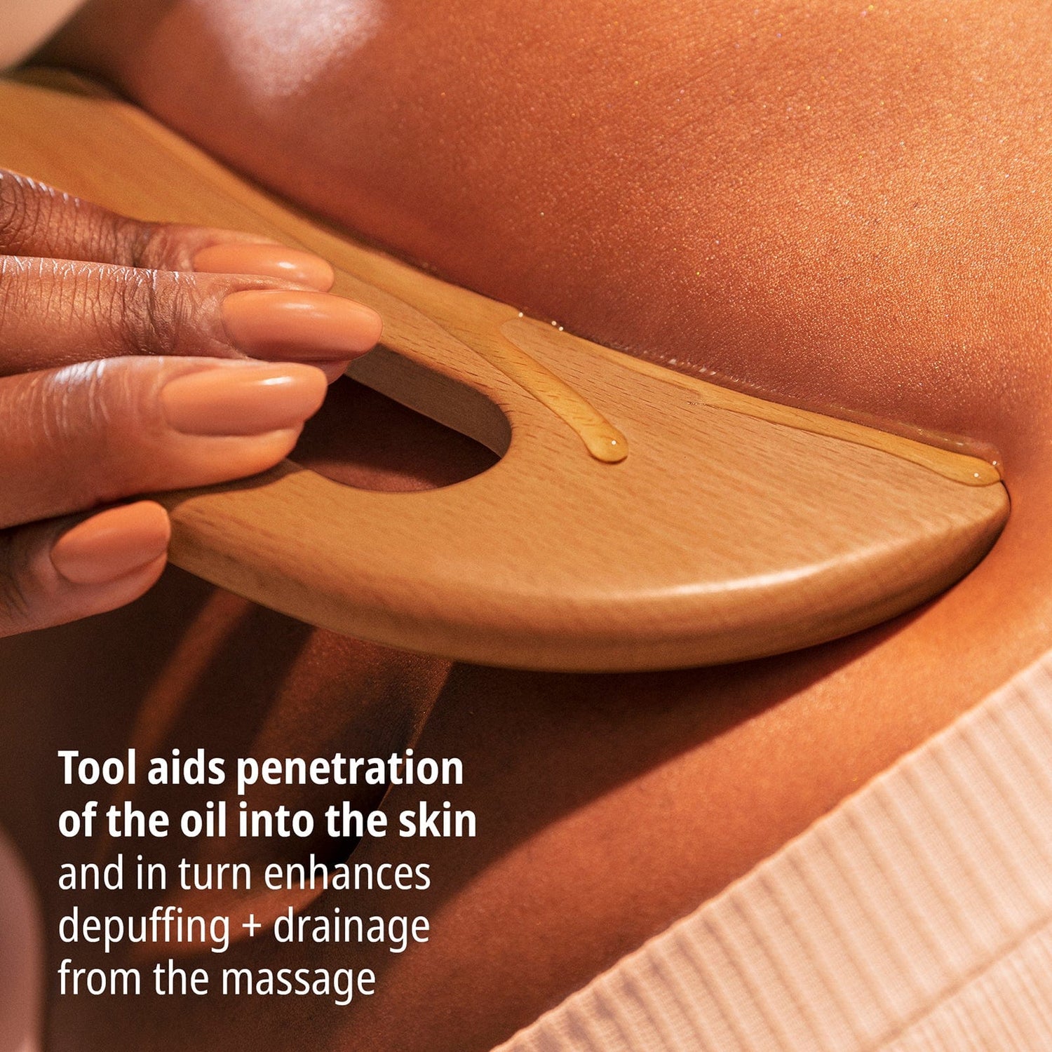 Tool aids penetration of the oil into the skin and in turn enhances depuffing + drainage from the massage