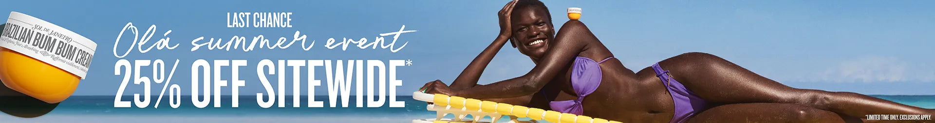 Two women sunbathing on a beach with a promotional banner for a summer event sale.