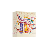 A boxed fragrance set labeled 'SOL DE JANEIRO' and 'SOL & CHEER' on a plain white background. The cream-colored box features illustrated colorful bottles and flowing ribbon graphics.