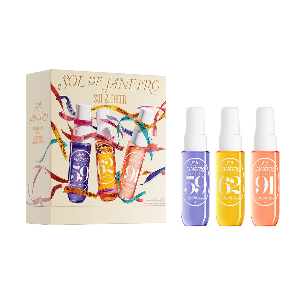 A boxed fragrance set labeled SOL DE JANEIRO / SOL & CHEER by A2 LIFESTYLE, shown with three matching spray bottles on a clean white background. The box is cream with colorful ribbon graphics and bottle illustrations in purple, orange, and peach.