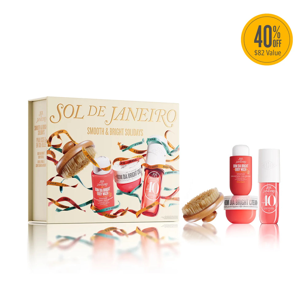 A boxed beauty gift set labeled SOL DE JANEIRO with several small cosmetic bottles and two wooden-bristle exfoliating pads arranged in front on a white background. A yellow circular '40% Off $82 Value' badge appears in the top right corner.