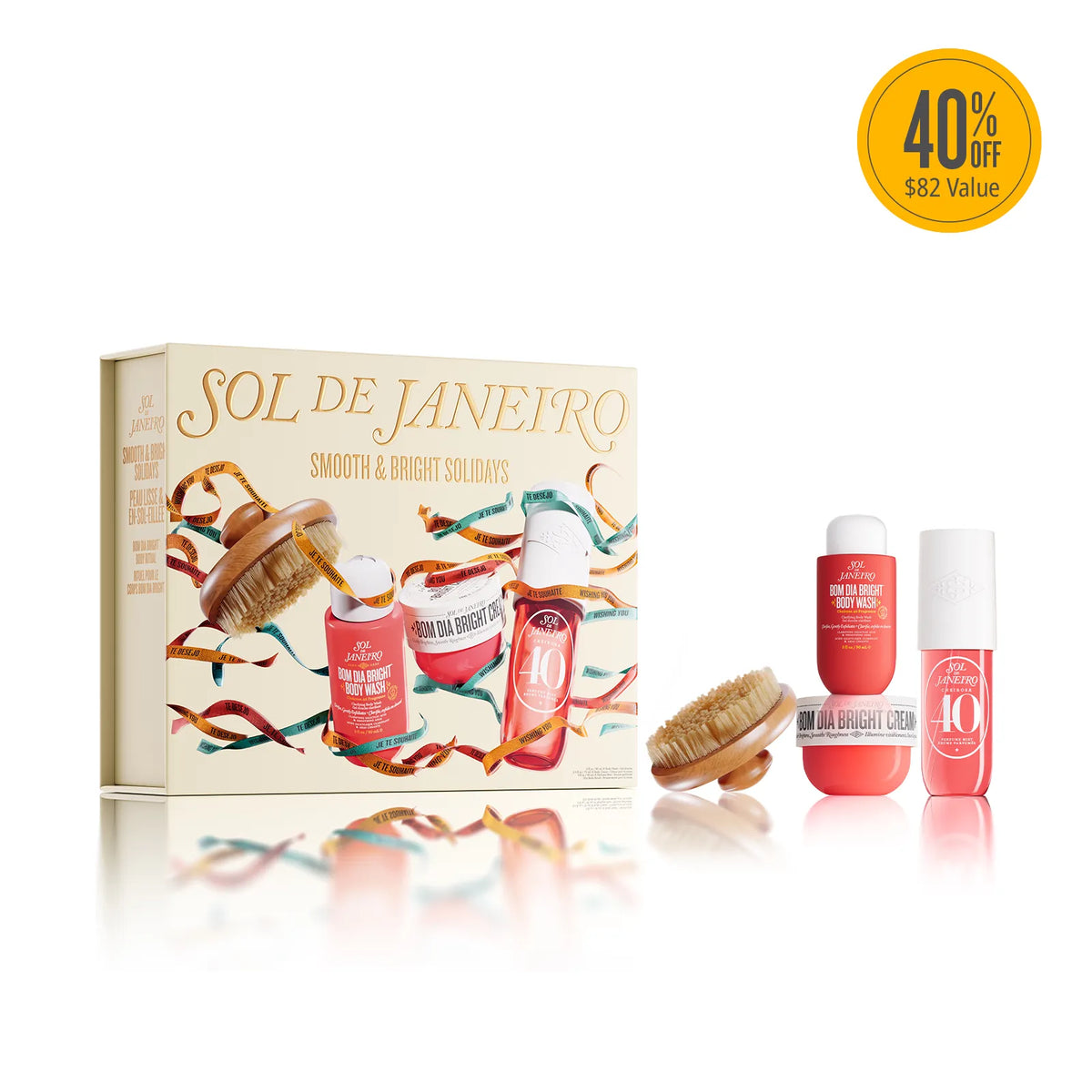 A boxed beauty gift set labeled SOL DE JANEIRO with several small cosmetic bottles and two wooden-bristle exfoliating pads arranged in front on a white background. A yellow circular '40% Off $82 Value' badge appears in the top right corner.