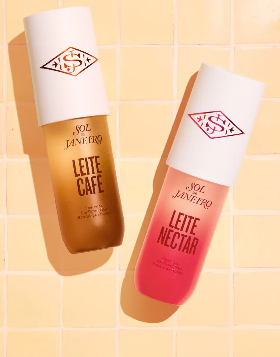Two bottles of Sol de Janeiro skincare products on a yellow checkered background