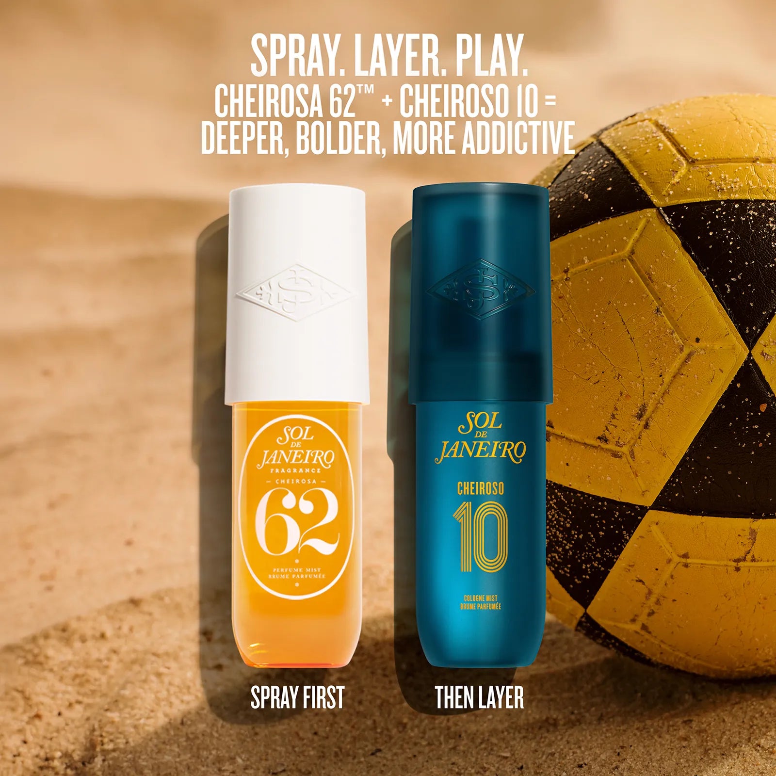 Two Sol Janeiro Cheiroso sunscreen bottles standing upright on a sandy beach-style background next to a yellow soccer ball. White text at the top reads &