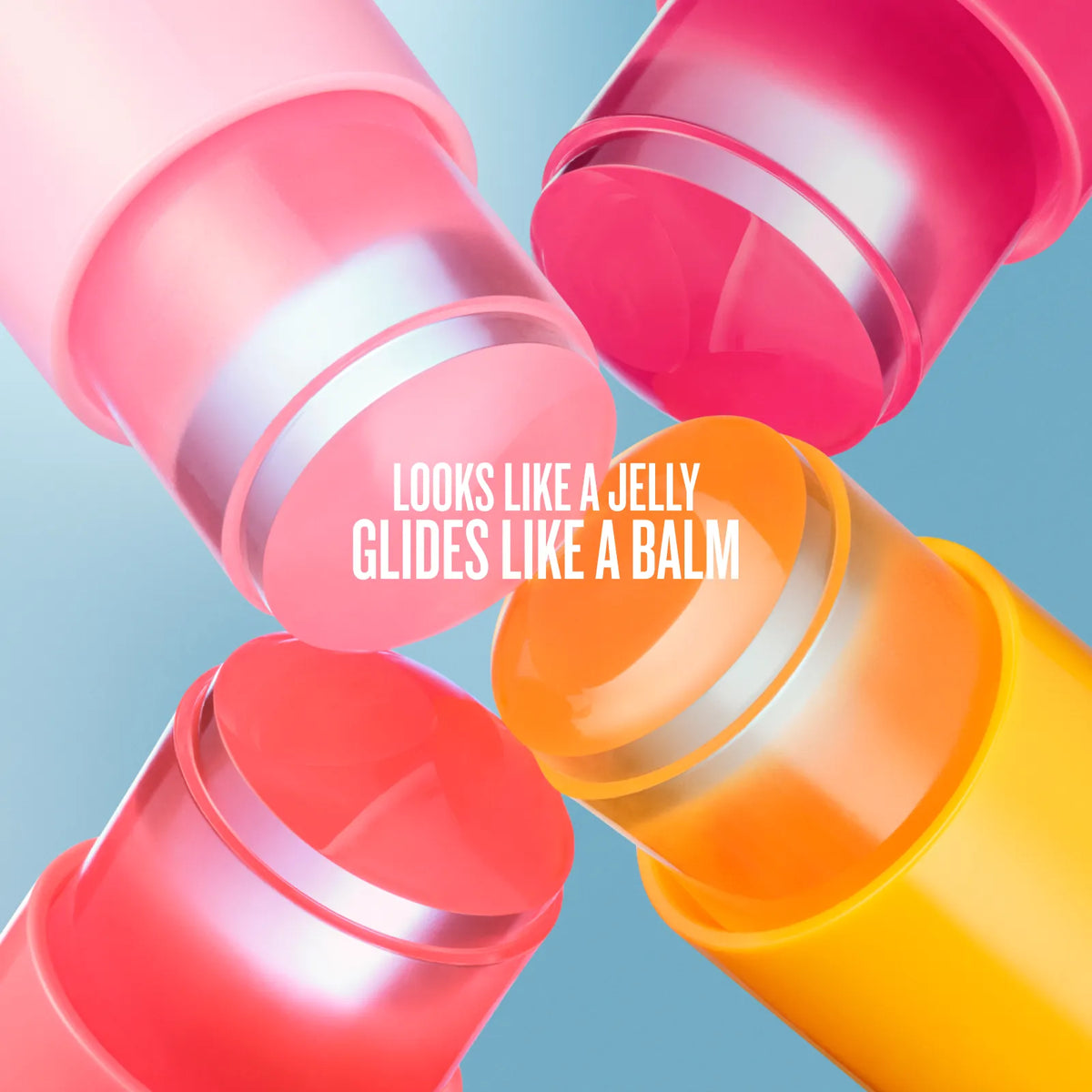 Four translucent lip balm tubes in pink, coral, orange, and yellow arranged diagonally on a light blue background, with white text reading 'LOOKS LIKE A JELLY GLIDES LIKE A BALM'.
