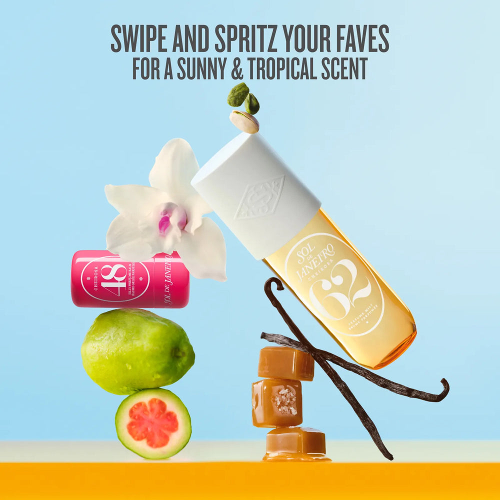 A promotional product graphic for SZA Aesthetic Beauty products. The main item is a clear bottle filled with golden-yellow liquid, shown tilted with a white cap, alongside a pink cylindrical item, a white orchid flower, a lime, a cut pink grapefruit, vanilla beans, and caramel cubes.