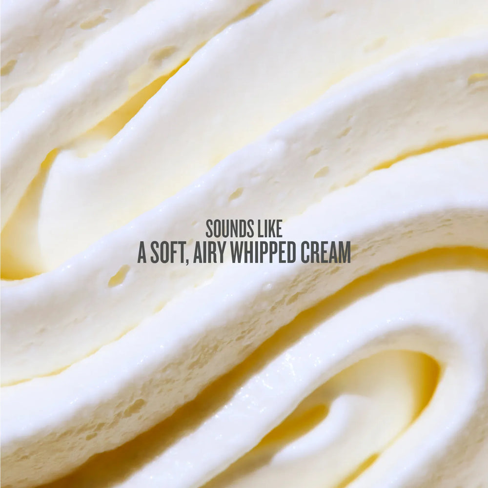 Close-up of whipped cream with text 'Sounds like a soft, airy whipped cream'.