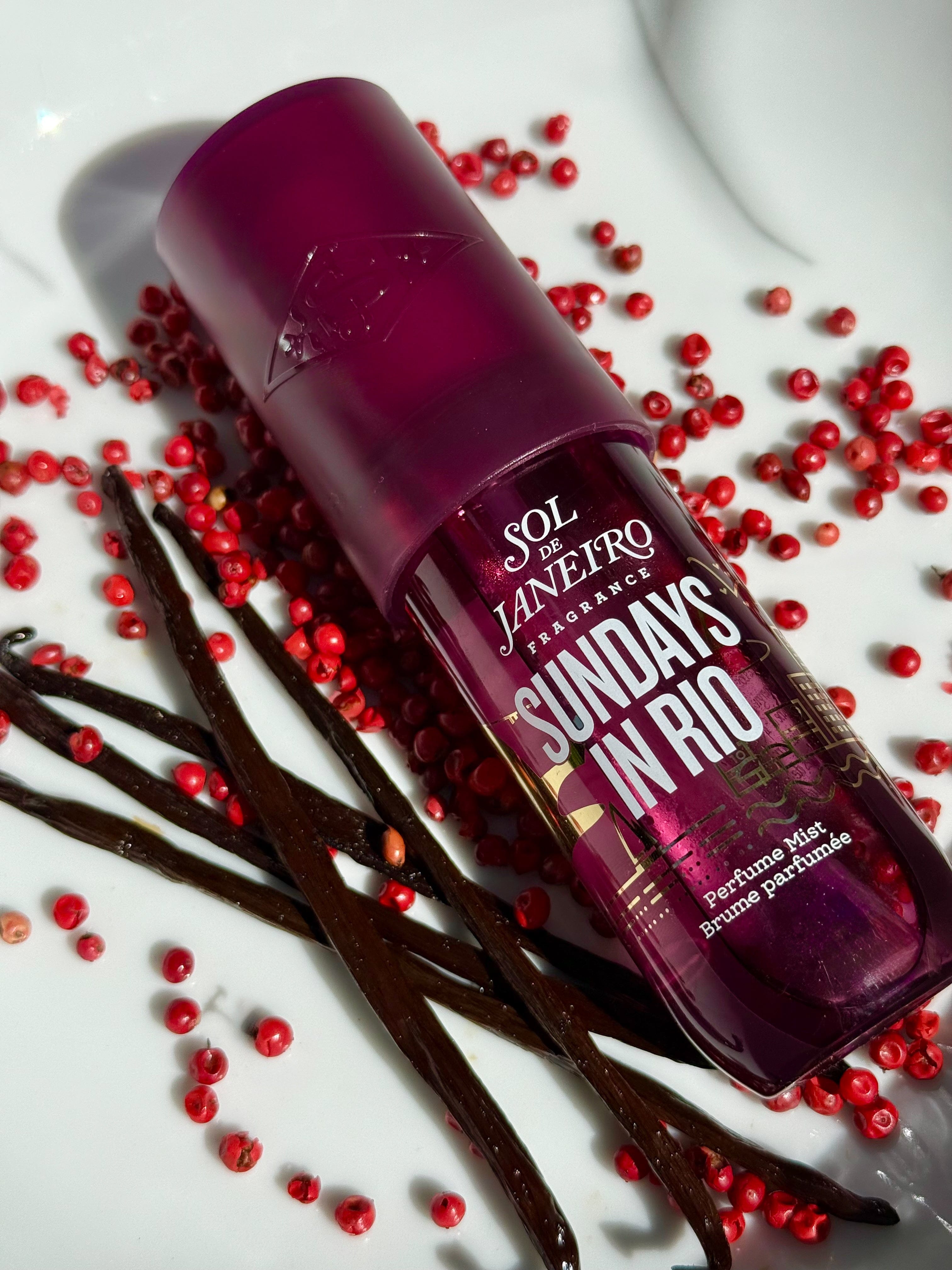 Scented bottle with 'Sundays in Rio' text on a white background with red berries and vanilla beans.