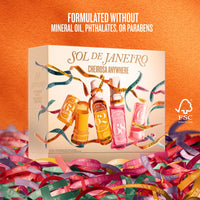 SOL DE JANEIRO Cheirosa Anywhere fragrance gift set box shown on an orange background with colorful confetti and ribbon-like strips around it. Text at the top reads 'FORMULATED WITHOUT MINERAL OIL, PHTHALATES, OR PARABENS' and an FSC logo appears on the right.